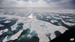 Sea ice melts on the Franklin Strait along the Northwest Passage in the Canadian Arctic Archipelago, July 22, 2017. Because of climate change, more sea ice is being lost each summer than is being replenished in winters. Less sea ice coverage also means that less sunlight will be reflected off the surface of the ocean in a process known as the albedo effect. The oceans will absorb more heat, further fueling global warming. 