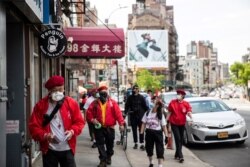 Wally Ng, a member of the Guardian Angels, patrols with other members in Chinatown during the outbreak of the coronavirus disease (COVID-19) in New York City, New York, U.S., May 16, 2020.