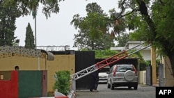 FILE - A vehicle enters into the Afghan Embassy in Islamabad on July 19, 2021. 