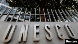 The logo of the U.N. Educational, Scientific and Cultural Organization is seen in front of its headquarters in Paris, Oct. 4, 2017.
