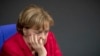 Merkel's CDU Agrees to Pursue Grand Coalition in Germany