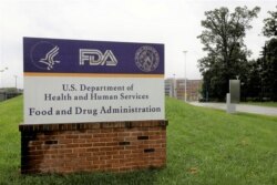 FILE - Signage sits outside the Food and Drug Administration headquarters in White Oak, Md., Aug. 29, 2020.
