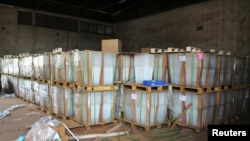 Electoral materials are stacked in a customs office after shipment from France in Bamako, Mali, June 18 2013. 