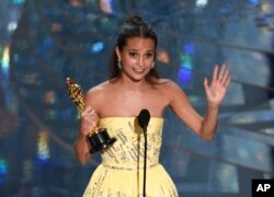 Alicia Vikander accepts the award for best actress in a supporting role for “The Danish Girl” at the Oscars on Feb. 28, 2016, at the Dolby Theatre in Los Angeles.