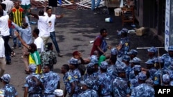 Ethiopian security forces intervene on Meskel Square in Addis Ababa, June 23, 2018, where a blast killed several people during a rally called by the Prime Minister Abiy Ahmed.