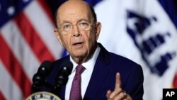 FILE - Department of Commerce Secretary Wilbur Ross speaks to department workers in Washington, July 16, 2018.