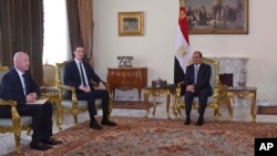 In this June 21, 2018, photo, provided by Egypt's state news agency, MENA, Egyptian President Abdel-Fattah el-Sissi, center, meets with President Donald Trump's son-in-law and senior adviser Jared Kushner, second left, and Middle East envoy Jason Greenbla