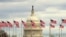 Flags fly in front of the U.S. Capitol in Washington, Jan. 1, 2019, as a partial government shutdown stretches into its third week. 