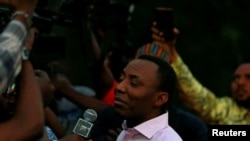 FILE - Prominent Nigerian journalist and activist Omoyele Sowore talks to the media after being released on bail by Nigeria's government, in Abuja, Nigeria, Dec. 24, 2019. 