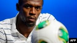 Le Jamaïcain Usain Bolt lors d'une conférence de presse au siège social de la Fifa, Zurich, le 28 août 2013.