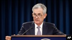 Kepala The Fed atau Bank Sentral Amerika, Jerome Powell memberikan penjelasan kepada media, di Washington DC Rabu (18/9). 