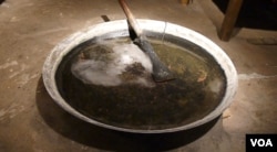 Drug paraphernalia on display at Doi Tung project in Thailand. (Photo: L. Hoang / VOA)