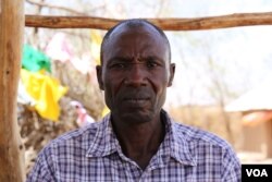 Michael Abukassin Kuku, a 48 year-old Sudanese refugee from Nuba, living in Kakuma refugee camp. Yahya was scheduled to fly from Kakuma to Nairobi on January 30, for processing before his resettlement in Tucson, Arizona, but the U.S. travel ban prevented him from doing so. He now waits for more information in Kakuma, Kenya, Feb. 6, 2017. (J. Craig / VOA)