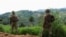 FILE - Members of the Armed Forces of the Democratic Republic of the Congo stand guard against the M23 rebel group in Lubero, North Kivu province, Oct. 27, 2024. The rebels have seized Masisi near the provincial capital Goma, local politicians said on Jan. 5, 2025.