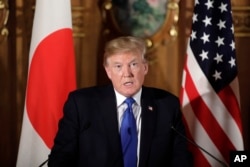 President Donald Trump speaks during a joint news conference with Japanese Prime Minister Shinzo Abe at the Akasaka Palace, Nov. 6, 2017, in Tokyo.