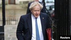 Britain's Foreign Minister Boris Johnson arrives in Downing Street for a meeting of the government's special COBRA committee in London, March 7, 2018.