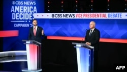U.S. Senator and Republican vice presidential candidate JD Vance and Minnesota Governor and Democratic vice presidential candidate Tim Walz participate in the vice presidential debate hosted by CBS News at the CBS Broadcast Center in New York City on Oct. 1, 2024.