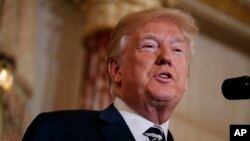 President Donald Trump speaks during a ceremonial swearing in for new Secretary of State Mike Pompeo at the State Department, May 2, 2018, in Washington. 