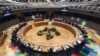 FILE - European Union leaders meet at a roundtable during an EU summit in Brussels, Belgium, Feb. 21, 2020.