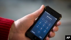 iPhone di Washington, 17 Februari 2016. (AP Photo/Carolyn Kaster) 