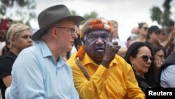 Yunupingu, an influential Australian Indigenous leader, is seen with Australian Prime Minister Anthony Albanese in this July 29, 2022 handout photo in Australia. Melanie Faith Dove/Yothu Yindi Foundation/Handout via REUTERS