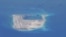 FILE - Chinese dredging vessels are purportedly seen around Fiery Cross Reef in the disputed Spratly Islands in the South China Sea in this image from video taken by a P-8A Poseidon surveillance aircraft provided by the U.S. Navy, May 21, 2015. 