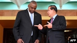 U.S. Defense Secretary Lloyd Austin listens as Cambodian Senate President Hun Sen speaks during a meeting in Phnom Penh on June 4, 2024. (Cambodia Senate via AFP) 