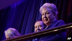 FILE - In this Nov. 9, 2016 file photo, federal judge Maryanne Trump Barry, older sister of Donald Trump, sits in the balcony during Trump's election night rally in New York.