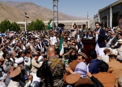 FILE - Ahmad Masood, son of Afghanistan's anti-Soviet resistance hero Ahmad Shah Masood, speaks to supporters in Bazarak, Panjshir province, Afghanistan, Sept. 5, 2019.