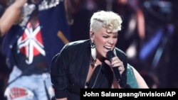 FILE - Pink performs at the 2017 iHeartRadio Music Festival Day 1 held at T-Mobile Arena in Las Vegas, Sept. 22, 2017.