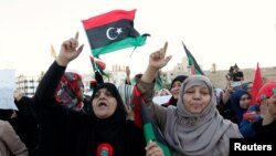 FILE - Demonstrators protest against what they say is French military intervention in Libya, at Martyrs Square in Tripoli, Libya, July 22, 2016.