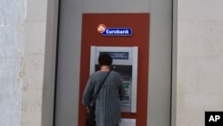 Greece lift the last remaining restrictions, Sept. 2, 2019, imposed on bank depositors more than four years ago at the height of the country's financial crisis.