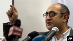 FILE - Presidential candidate Khaled Ali gives a press conference at his office in Cairo, Egypt, Jan. 17, 2018.