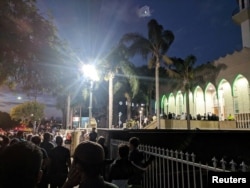 People gather at a vigil for Christchurch shootings victims at Lakemba Mosque in Sydney, Australia, March 15, 2019 in this picture obtained from social media.