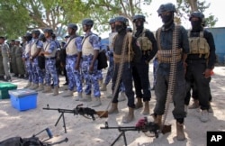 Somali soldiers prepare to secure the capital on the eve of presidential elections in Mogadishu, Feb. 7, 2017.
