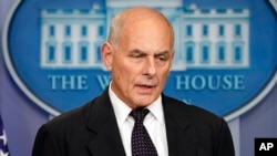 FILE - White House Chief of Staff John Kelly speaks to the media during the daily briefing in the Brady Press Briefing Room of the White House, Oct. 19, 2017.