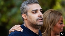 Canadian al-Jazeera English journalist Mohamed Fahmy after being released from Torah prison in Cairo, Sept. 23, 2015.
