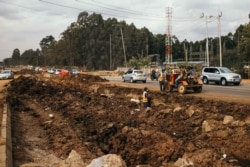 In this August 2020 photo, a section of Ngong Road is seen in the Karen neighborhood in Nairobi under construction. The project is part of Kenya's attempt to mitigate the growing traffic problem in the capital. (Kang-Chun Cheng/VOA)