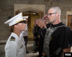 A new cadet reports to the cadet in the red sash during the U.S. Military Academy at West Point’s Reception Day, June 27, 2016. (Staff Sgt. Vito T. Bryant/U.S. Army)