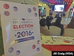 Guests attend an election results watch breakfast at the home of U.S. Ambassador Robert Godec in Nairobi, Kenya, Nov. 9, 2016.