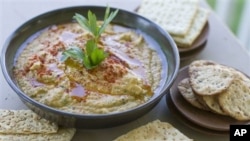 Farmers who grow chick peas, which is used to make hummus (above), worry a proposed farm bill encourages growers to plant whatever crop would give the biggest federal payout, rather than what the market calls for.