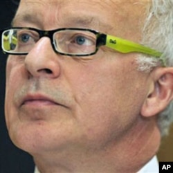 Lawyer Phil Shiner listens during a press conference in London (File)