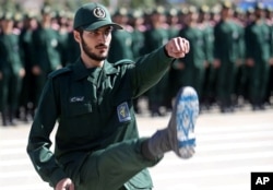 FILE PHOTO: An Iranian Officer of Revolutionary Guards,is is shown during graduation ceremony, held for the military cadets in a military academy, in Tehran, Iran June 30, 2018.