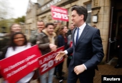 Britain's opposition Labor Party leader Ed Miliband leaves after a campaign event in Colne, northern England, May 6, 2015.