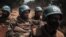 FILE - Moroccan peacekeepers from the U.N. Multidimensional Integrated Stabilization Mission in the Central African Republic (MINUSCA) patrol in Bangassou, Feb. 3, 2021. The force's mandate has been extended until November 2025.
