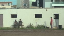 North Korean workers take a break in front of the compound in Quakam, Dakar, Senegal, Sept. 16, 2019. (Credit: Kim Seon-myung)
