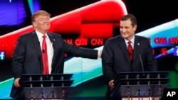 Donald Trump, left, jokes with Ted Cruz during the CNN Republican presidential debate at the Venetian Hotel &amp; Casino on Tuesday, Dec. 15, 2015.