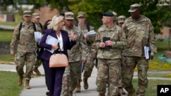 FILE - Army Secretary Christine Wormuth walks during a tour with soldiers at Fort Jackson, a U.S. Army Training Center, Sept. 25, 2024, in Columbia, S.C. 