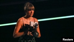 Taylor Swift receives the award for the Best Longform Video during the 2022 MTV Europe Music Awards (EMAs) at the PSD Bank Dome in Duesseldorf, Germany, Nov. 13, 2022.