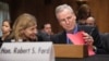 FILE - Robert Ford, U.S. ambassador to Syria, arrives to testify to the Senate Foreign Relations Committee about the conflict in Syria, on Capitol Hill in Washington.